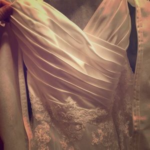 A size 16 pre owned Alfred Angelo wedding dress.